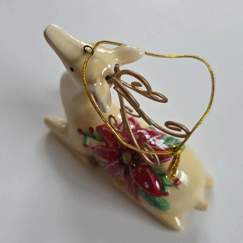 Holiday Reindeer Ornament with Red Flower Accents